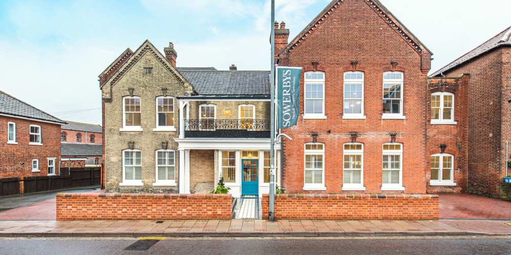 Outside of Collison Place with Sowerbys sign