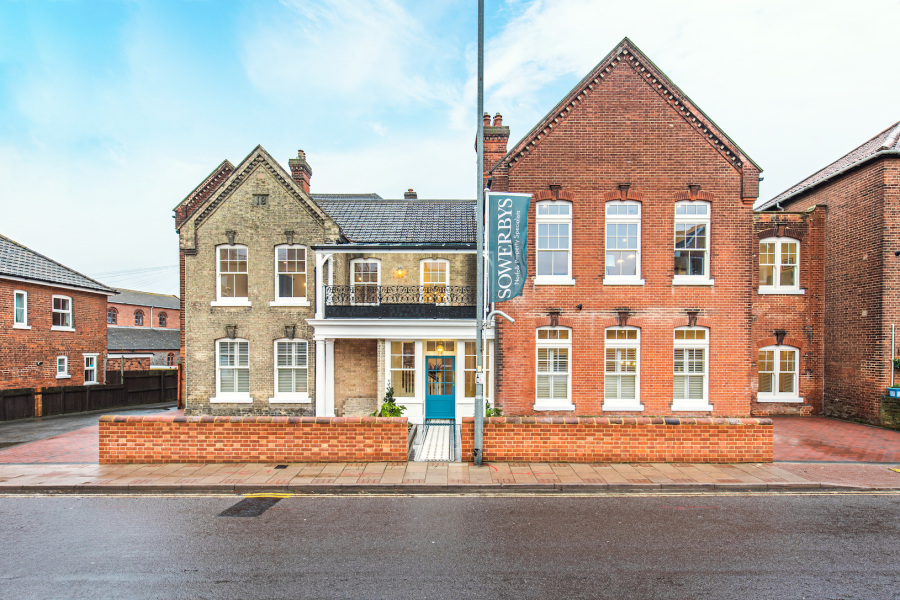 Outside of Collison Place with Sowerbys sign